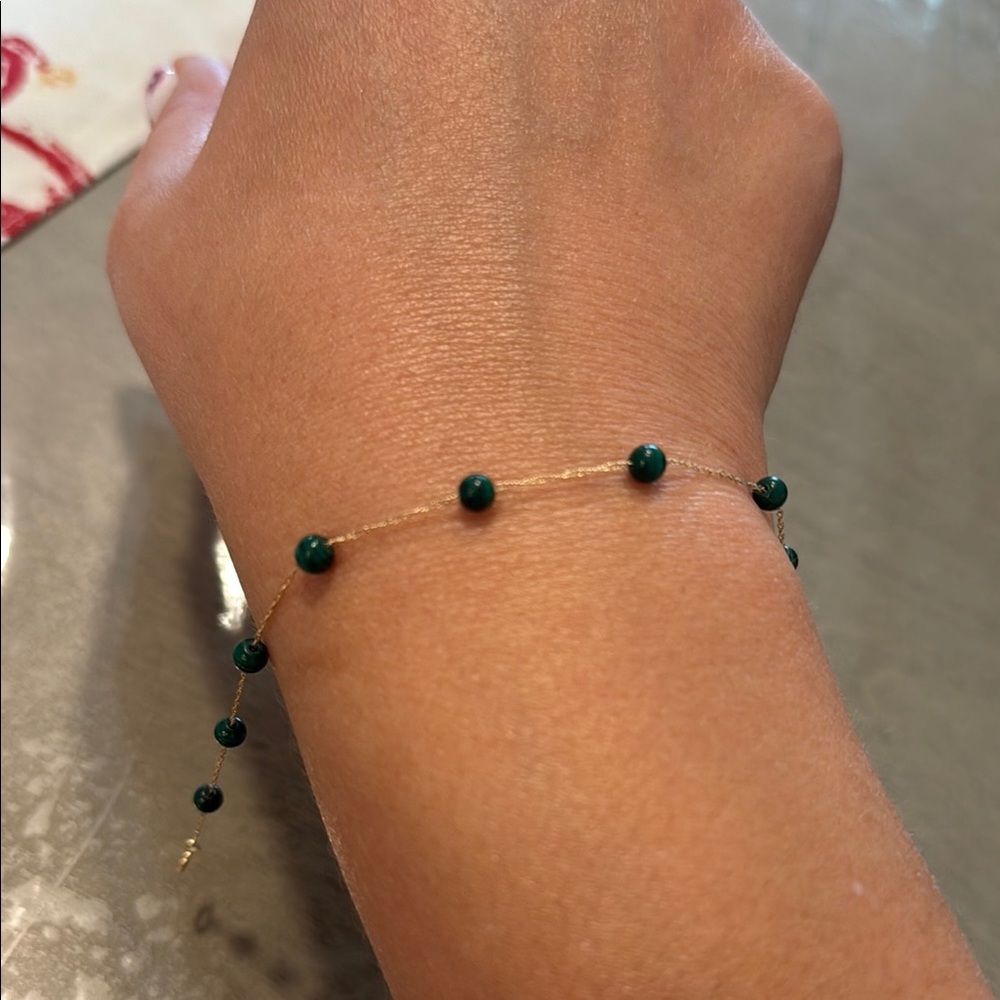 14K Elegant Gold Bracelet with Green Accents
